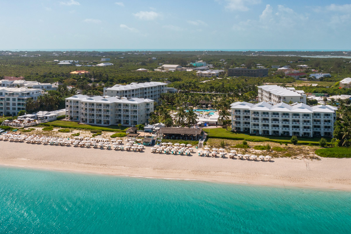 Aerial view of Alexandra Resort on Grace Bay Beach, one of the best all-inclusive family resorts in Turks and Caicos